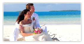 A couple spending their honeymoon at a tranquil beach